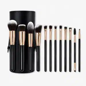 YT-SMB-009 vegan synthetic makeup brush set of 12 pieces next to black cylinder leather storage tube
