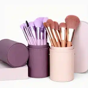 YT-SMB-005 vegan synthetic makeup brushes 11 pieces shown in matching lilac purple and nude peach leather cylinders