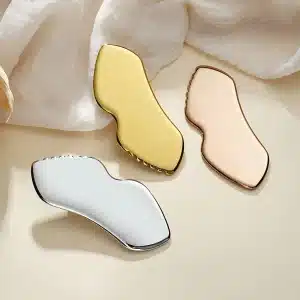 YT-SSG-019 lip-shaped stainless steel gua sha tool in silver gold and rose gold finishes