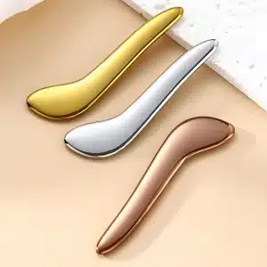 YT-SSG-003 musical-note-shaped stainless steel gua sha tool in natural gold and rose gold colors
