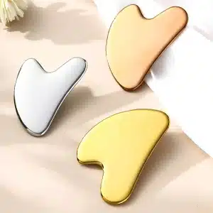 YT-SSG-001 heart-shaped stainless steel gua sha tool in natural gold and rose gold colors