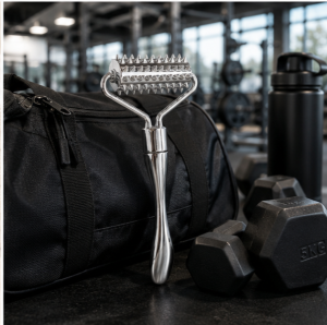 Wholesale spiked metal facial roller with a textured stainless steel head for stimulating massage, available for bulk OEM orders.