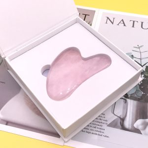 Heart-shaped wholesale rose quartz gua sha tool for B2B private label beauty brands.