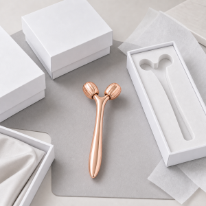 Wholesale 3D facial roller in rose gold for V-shape contouring massage, available for B2B private label and bulk orders.