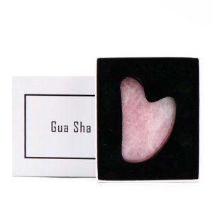 Heart-shaped wholesale rose quartz gua sha tool for B2B private label beauty brands.