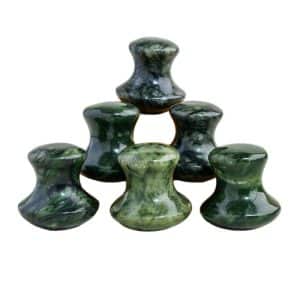 Wholesale jade mushroom massager tools for private label spas and B2B skincare retailers.