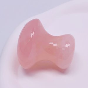 Wholesale rose quartz mushroom gua sha massage stone tool for B2B facial beauty brands and retailers.