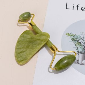 Wholesale green jade roller and gua sha set with gold hardware for B2B private label beauty brands.