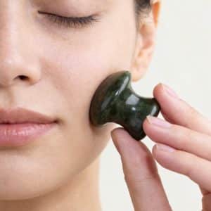 Wholesale jade mushroom massager tools for private label spas and B2B skincare retailers.